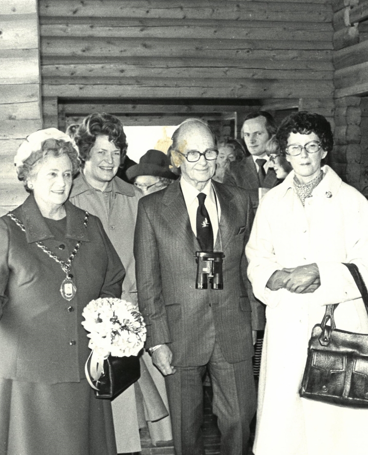 Sir Peter Scott and Janet Kear with others